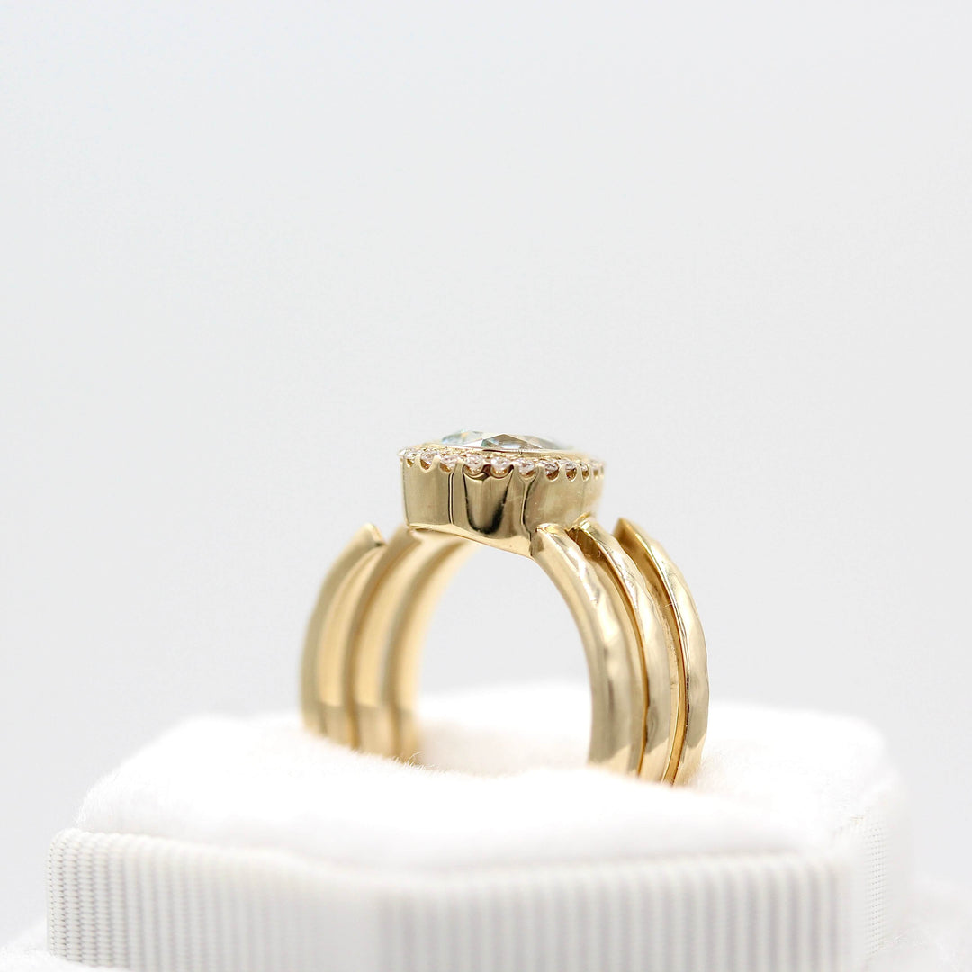 The Chelsea ring in yellow gold in a white velvet ring box