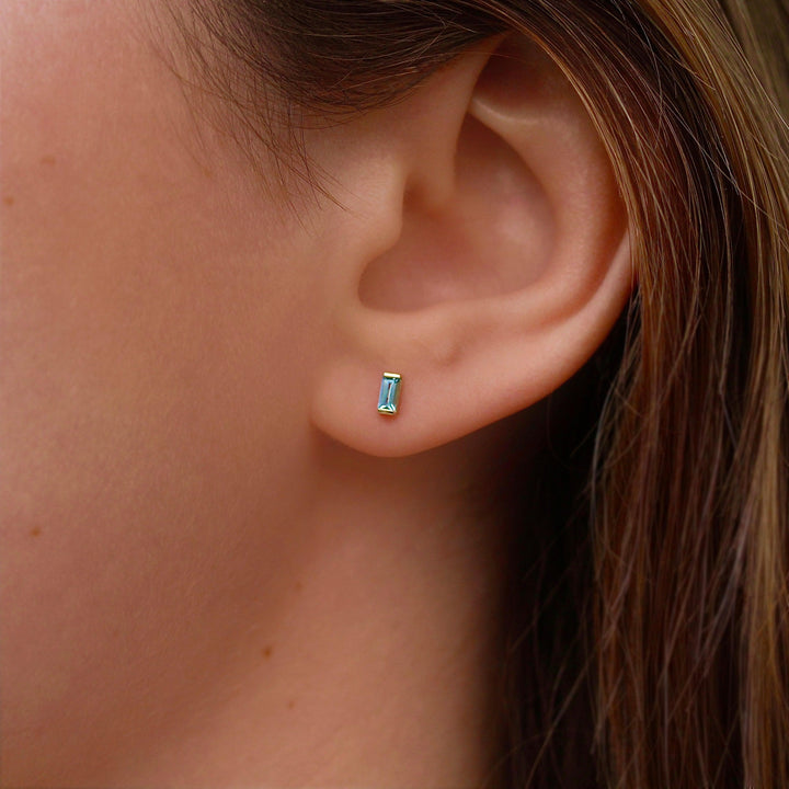 The August Baguette Birthstone Earrings with Chrysoberyl in Yellow Gold modeled