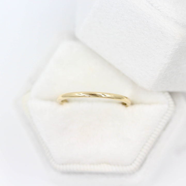 Classic Stacking Band in Yellow Gold in a white velvet ring box