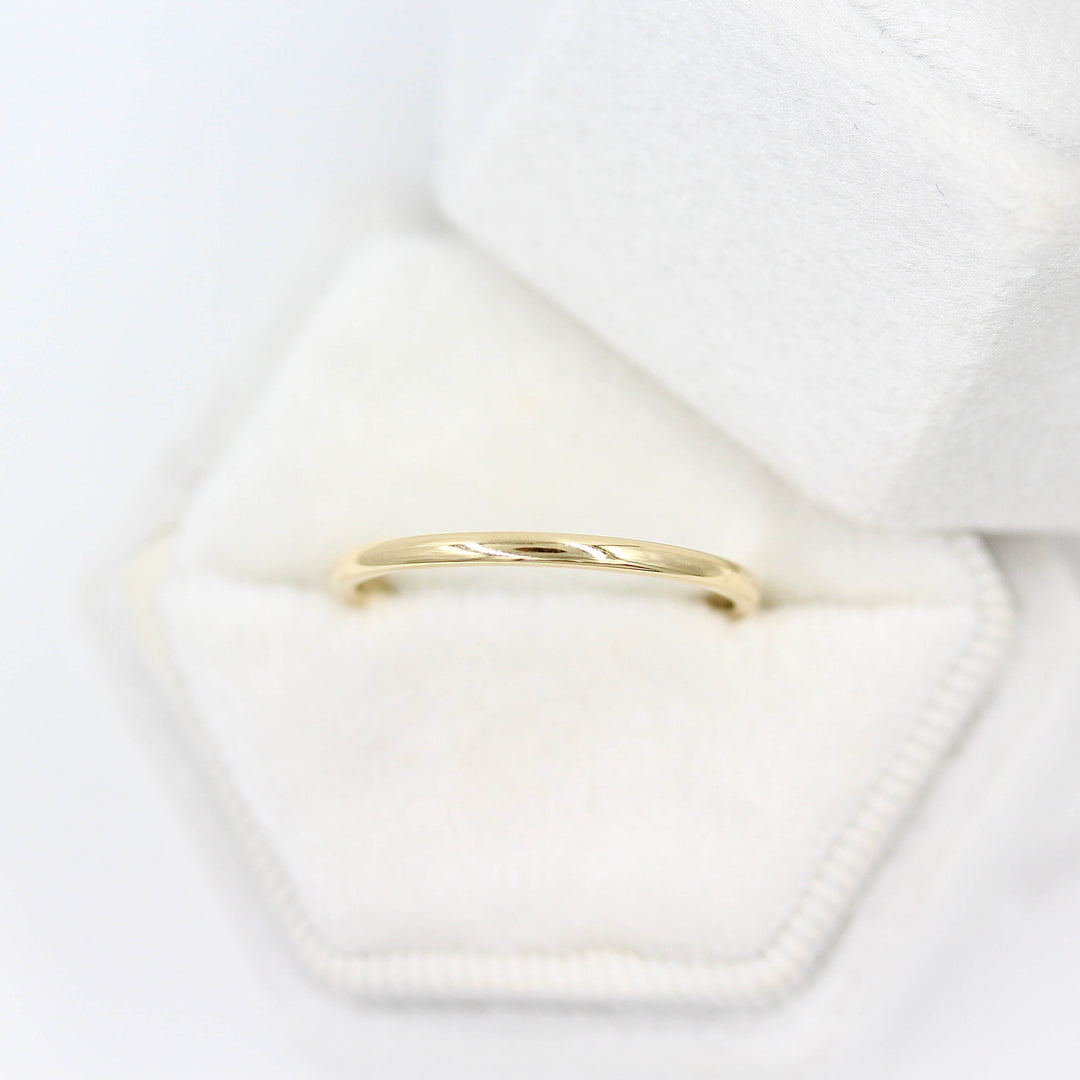 Classic Stacking Band in Yellow Gold in a white velvet ring box