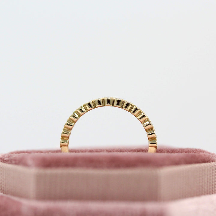 The April Florence Birthstone Wedding Band with Lab-Grown Diamond in Yellow Gold in a white velvet ring box