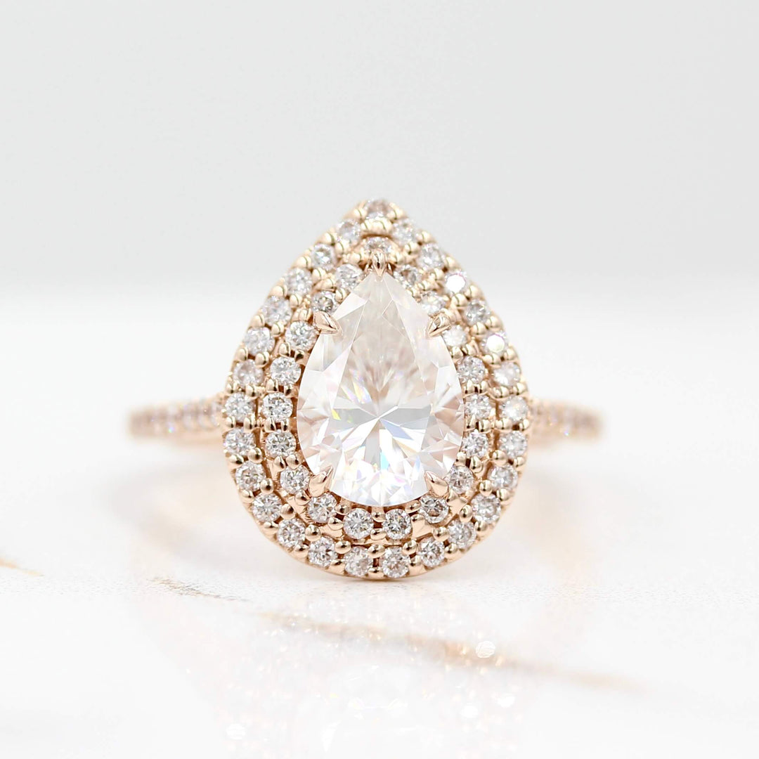 The Double-Halo Carly Ring in Rose Gold against a white background