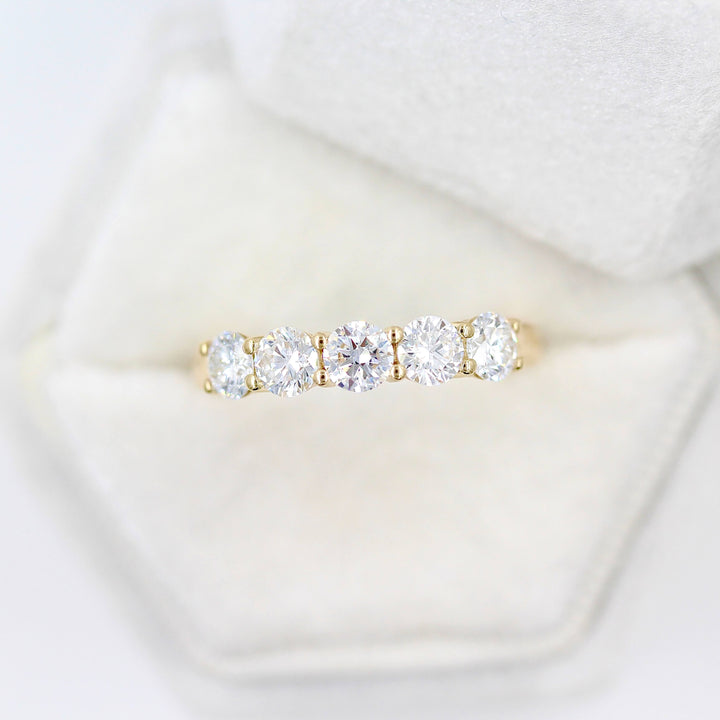 The Elisa Wedding Band in Yellow Gold with 1.25ct Lab-Grown Diamond in a white velvet ring box