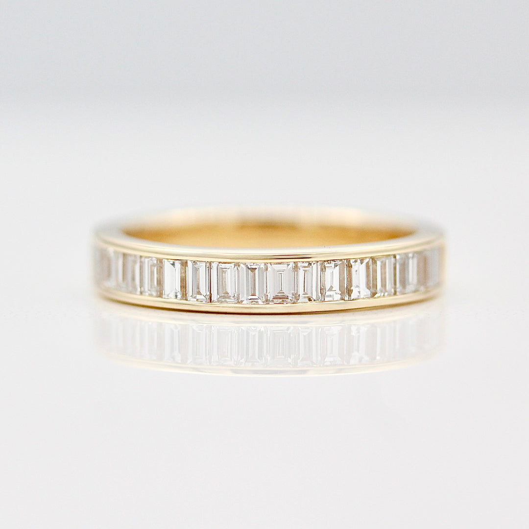 Yellow Gold Wedding Band with Channel set Baguette Diamonds.