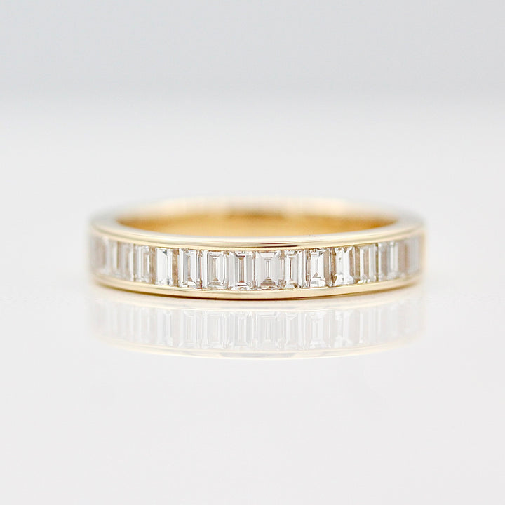 Yellow Gold Wedding Band with Channel set Baguette Diamonds.