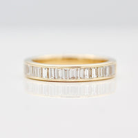 Yellow Gold Wedding Band with Channel set Baguette Diamonds.