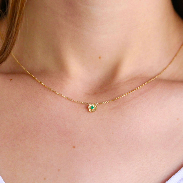 The May Birthstone Poppy Necklace with Emerald in Yellow Gold modeled