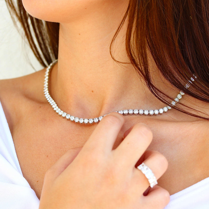 The Lab Grown Diamond Tennis Necklace in white gold modeled on a neck