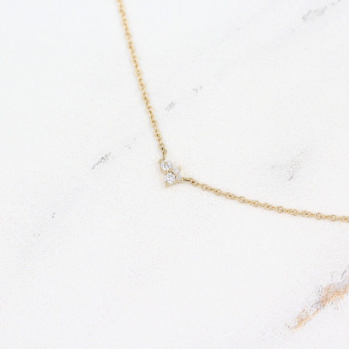 The Felicity Necklace in yellow gold against a white background