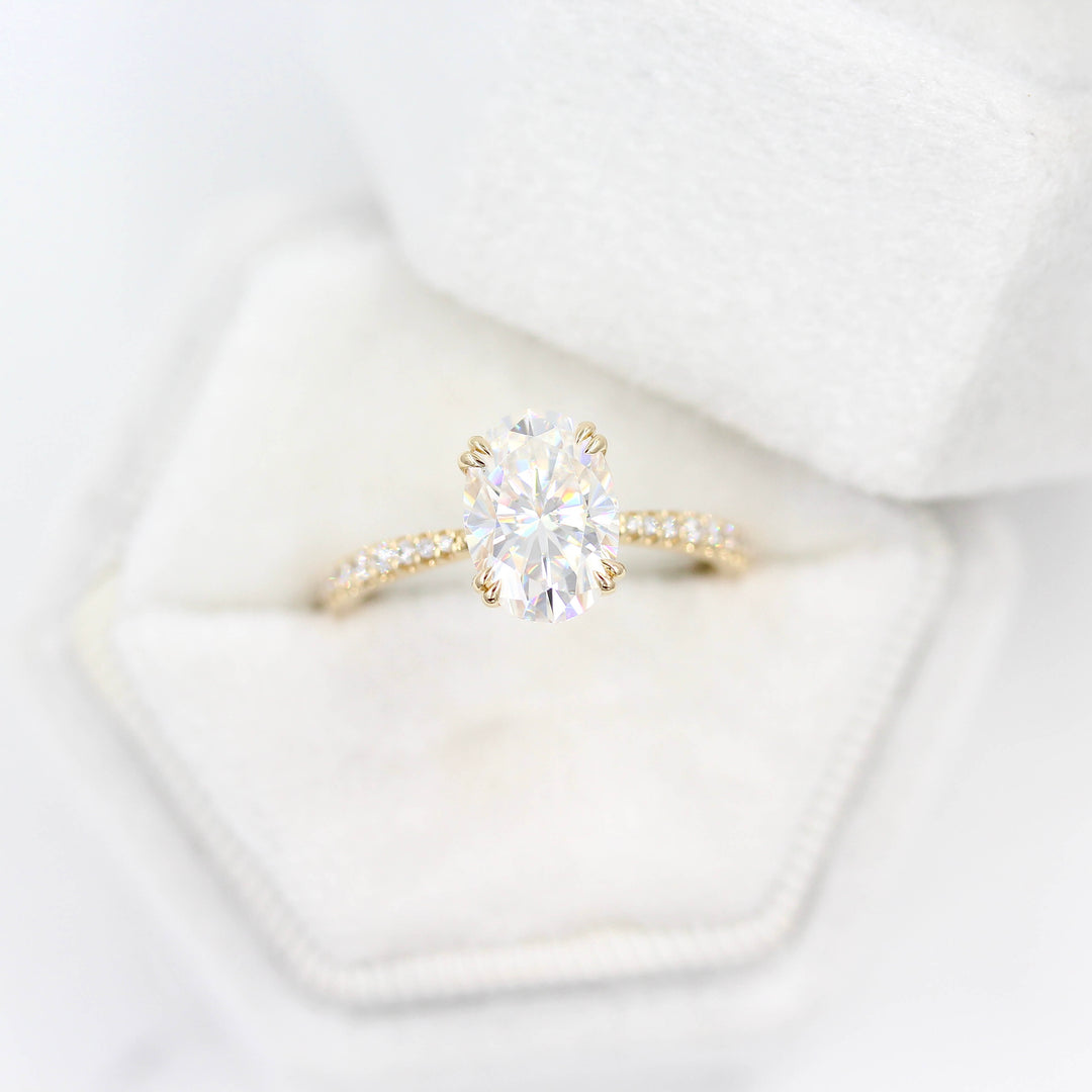The Grace Ring (Oval) in Yellow Gold and 2ct Moissanite in a white velvet ring box