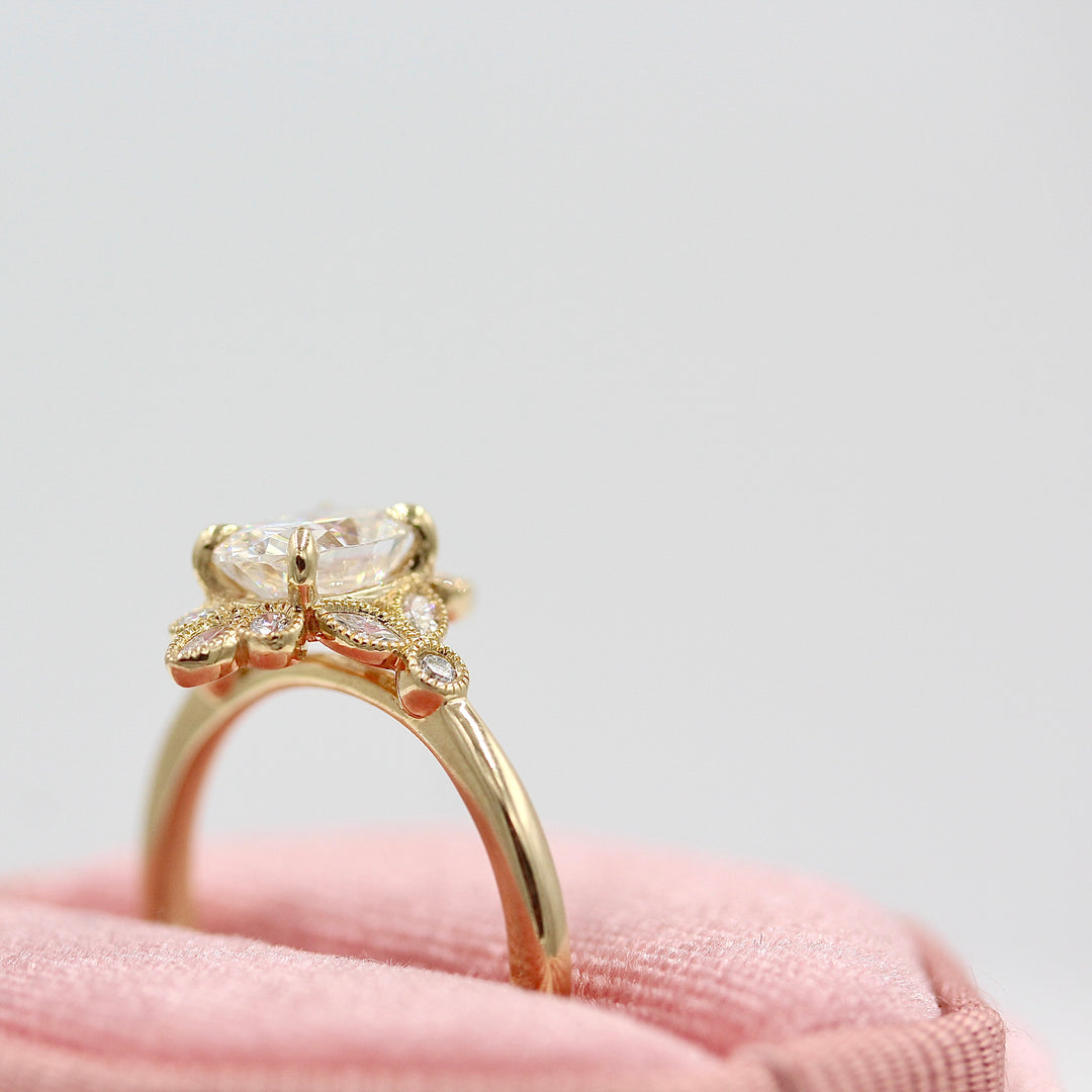 The Harlow ring in yellow gold in a pink velvet ring box