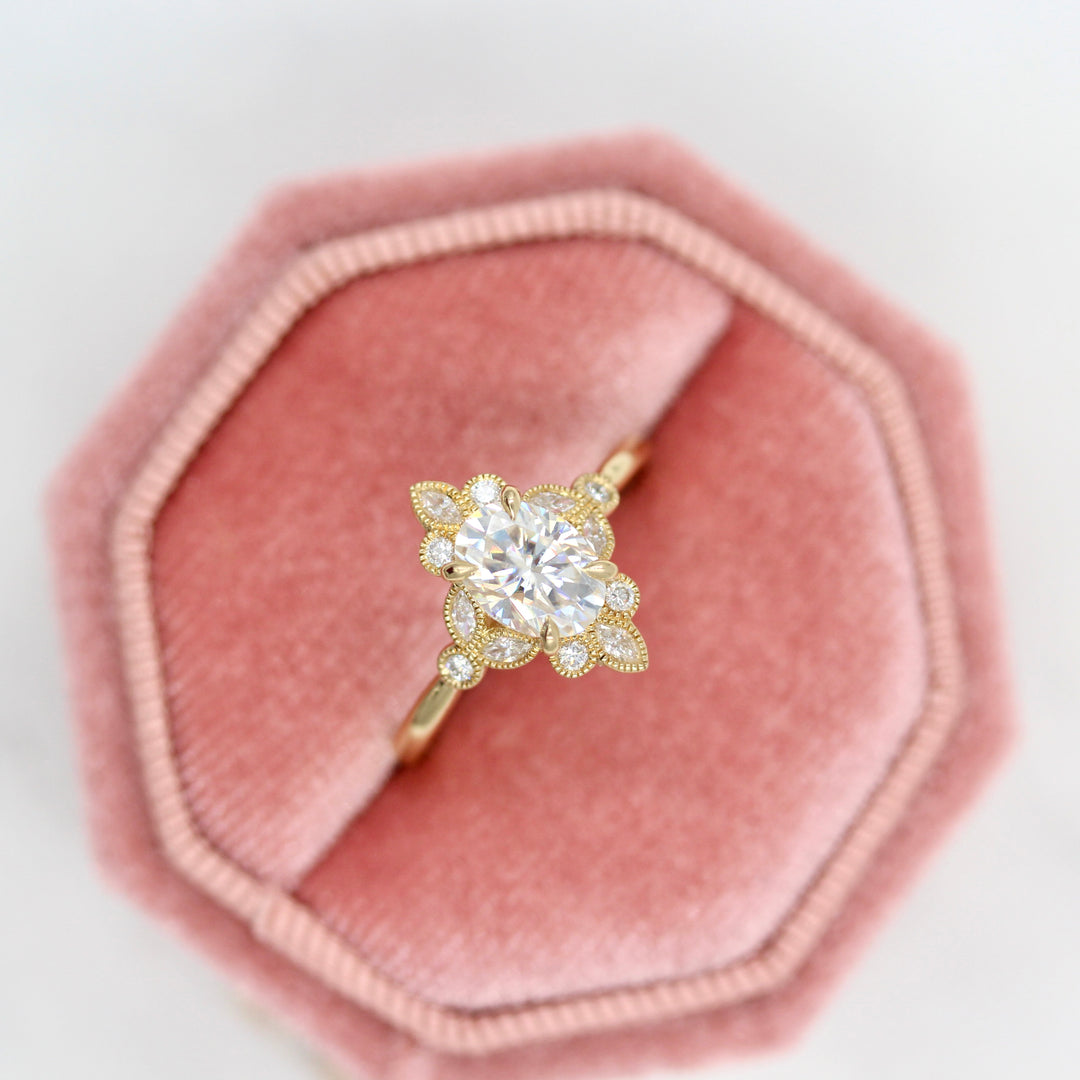 The Harlow ring in yellow gold in a pink velvet ring box