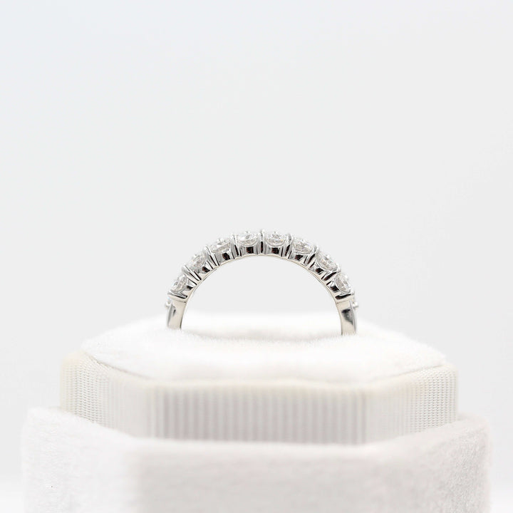 The Harmony Wedding Band in White Gold in a white velvet ring box