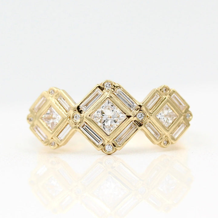 The Darby Ring in yellow gold against a white background