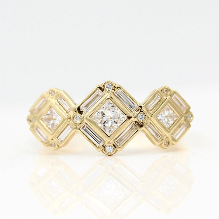 The Darby Ring in yellow gold against a white background