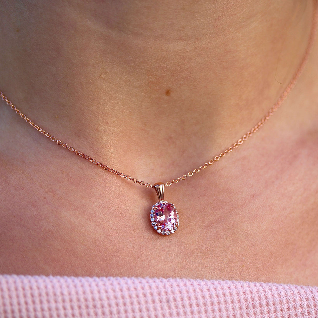 The Charlotte Necklace in Rose Gold modeled on a neck