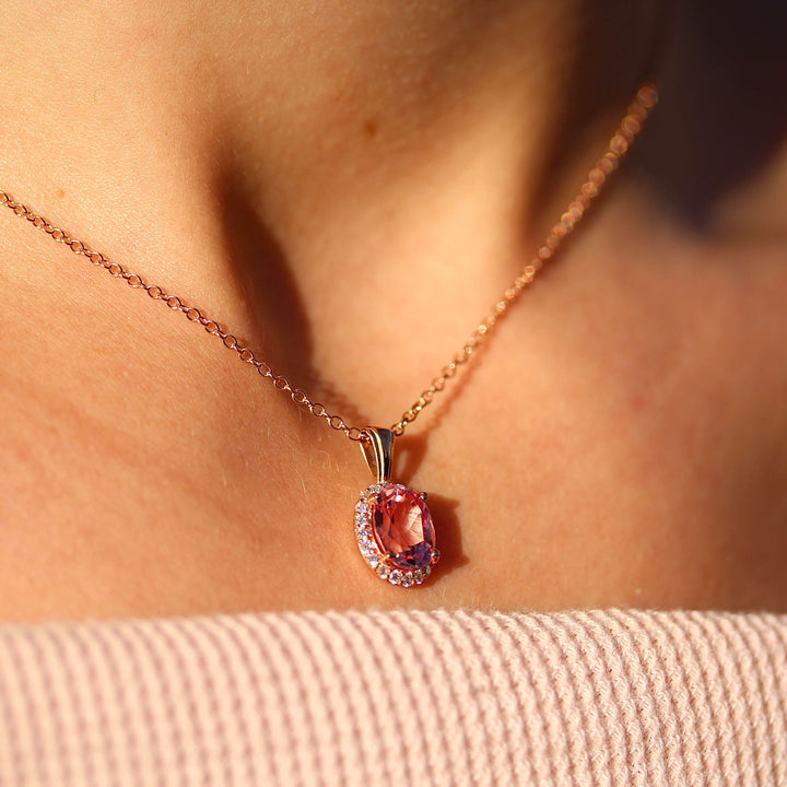 The Charlotte Necklace in Rose Gold modeled on a neck