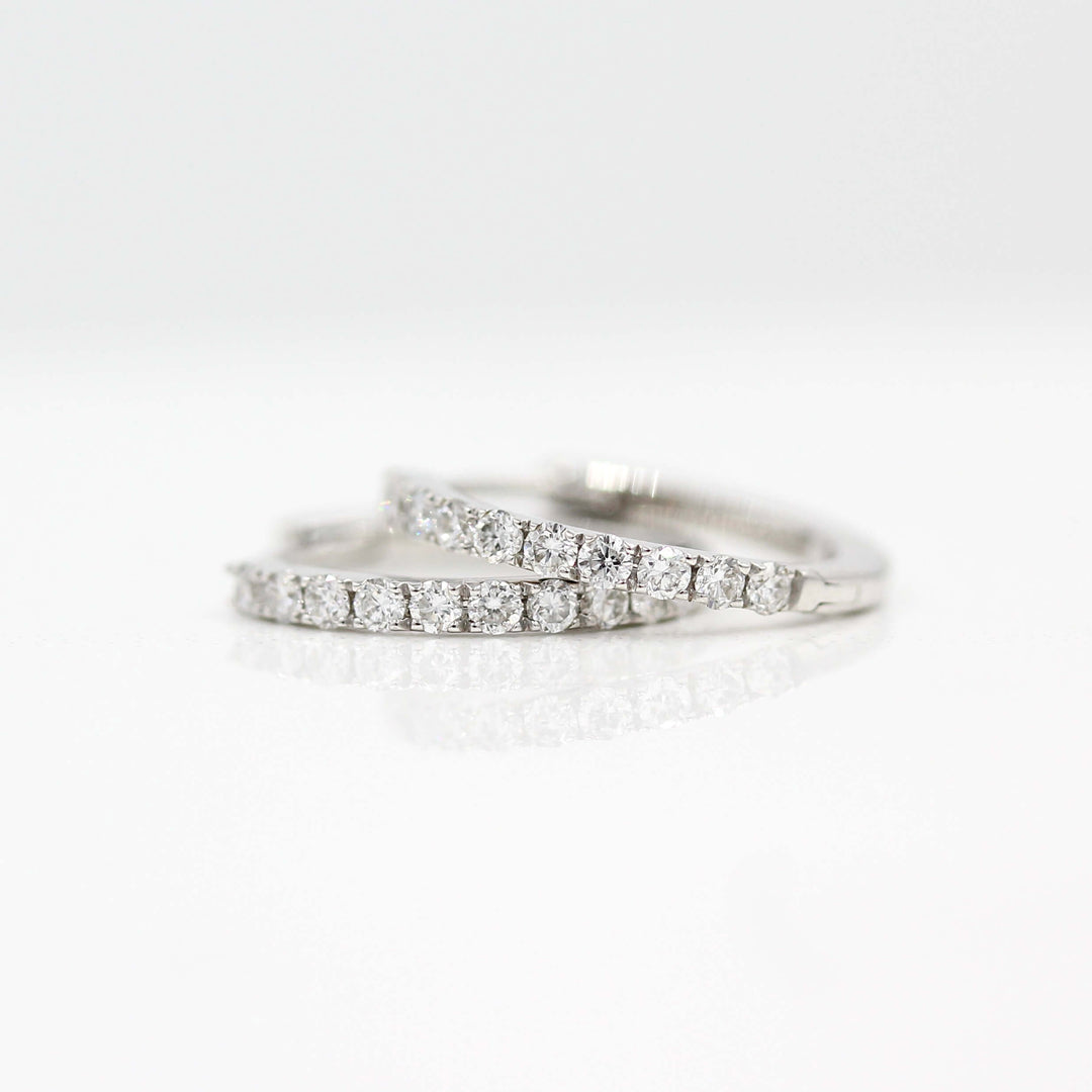 The 14mm Diamond Huggies in White Gold against a white background