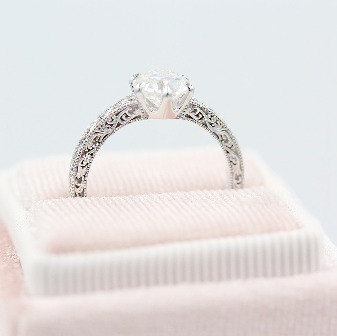 The Kathleen ring in white gold in a pink velvet ring box
