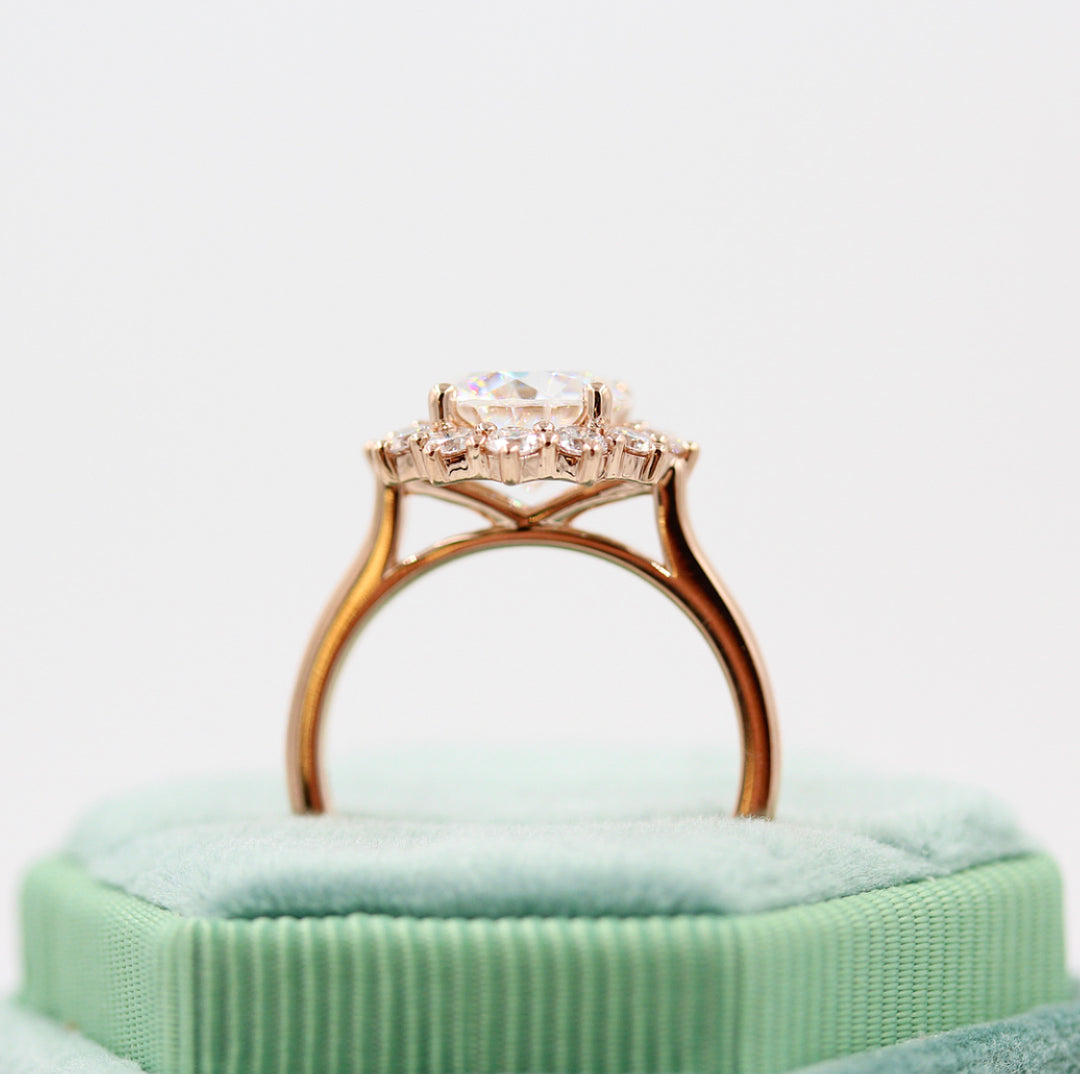 The Allie Ring (Round) - Moissanite in Rose Gold in a blue velvet ring box