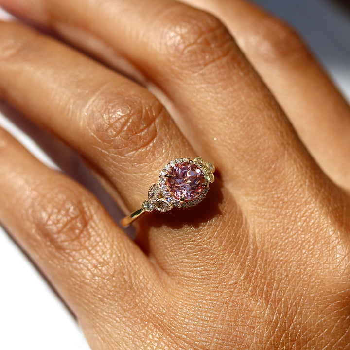 The Cate Ring (Round) in Yellow Gold and Peachy-Pink Created Sapphire modeled