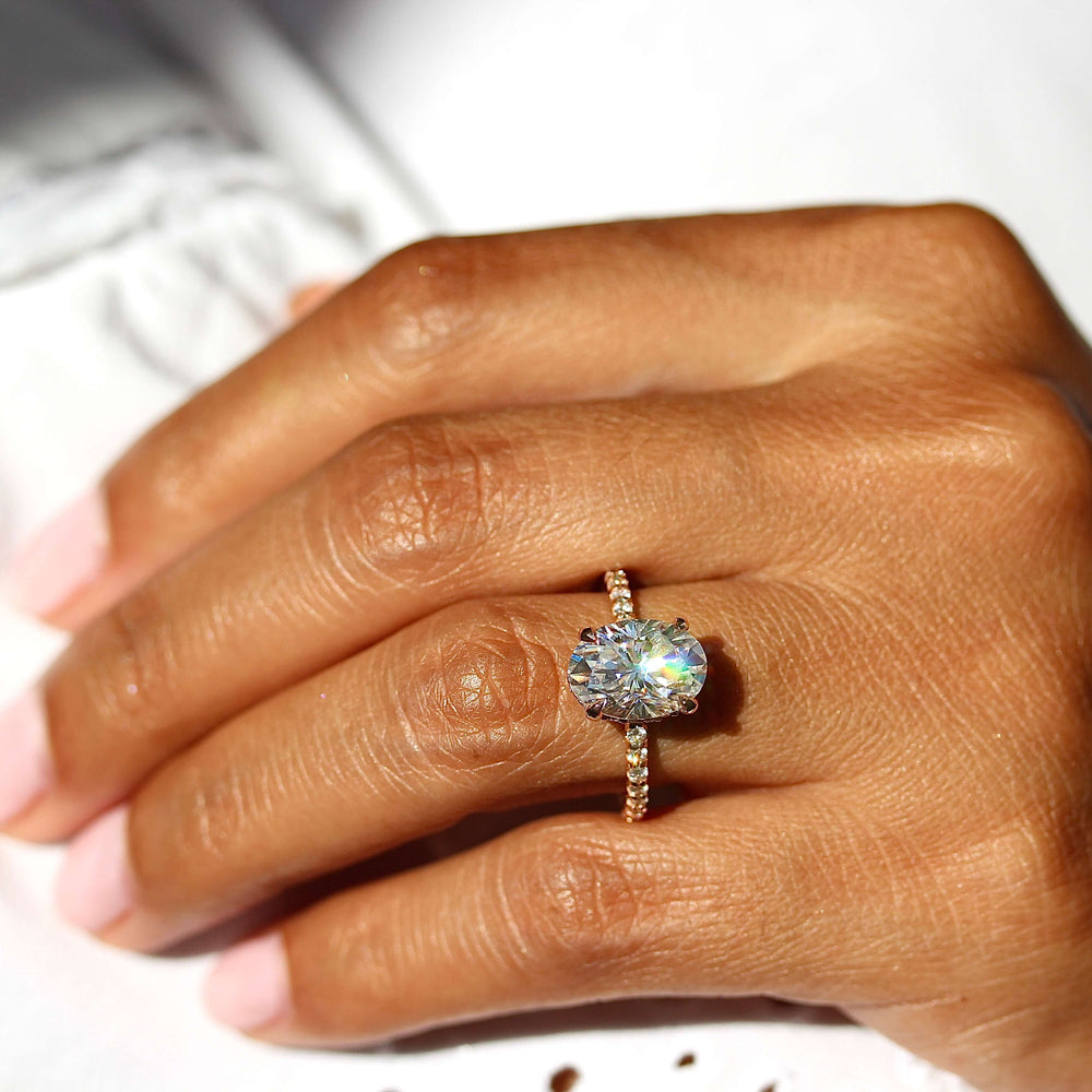 The Athena Hidden Halo Ring (Oval) in Rose Gold and Moissanite modeled