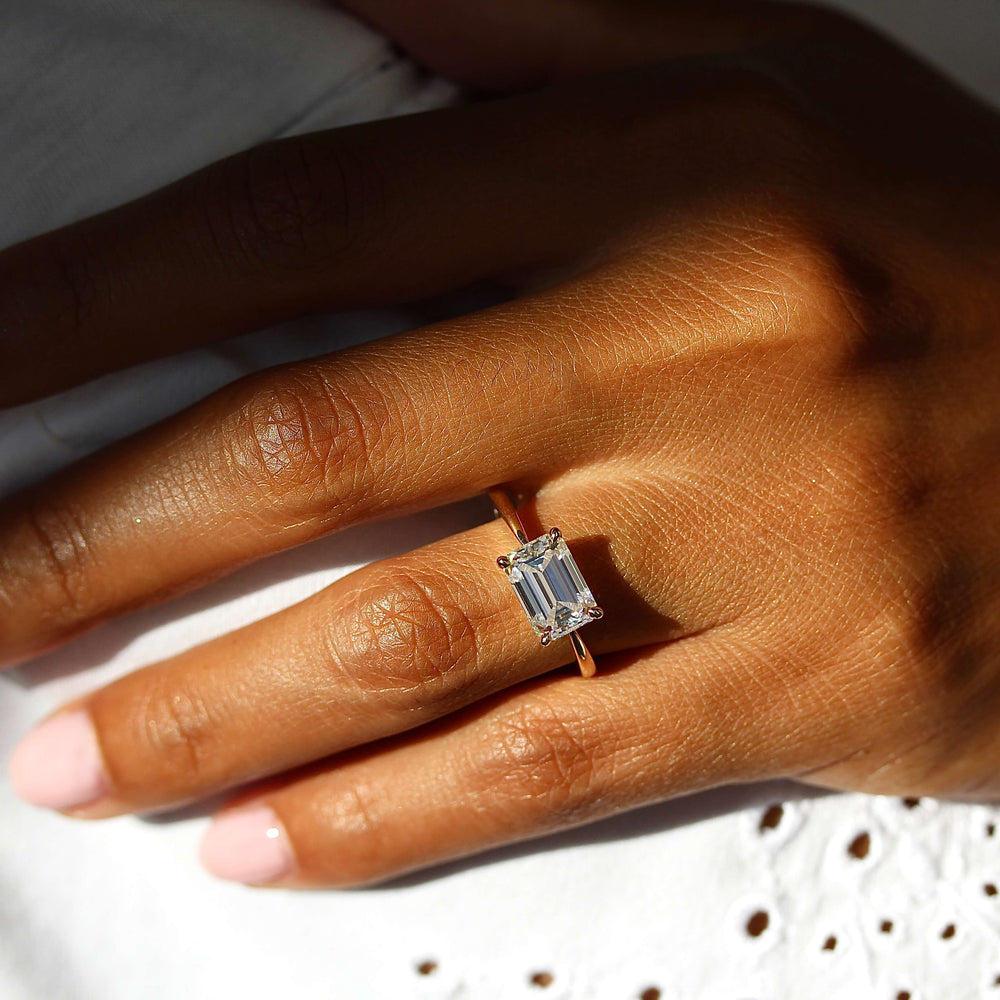 The Twyla Ring (Emerald) in Yellow Gold and Moissanite modeled