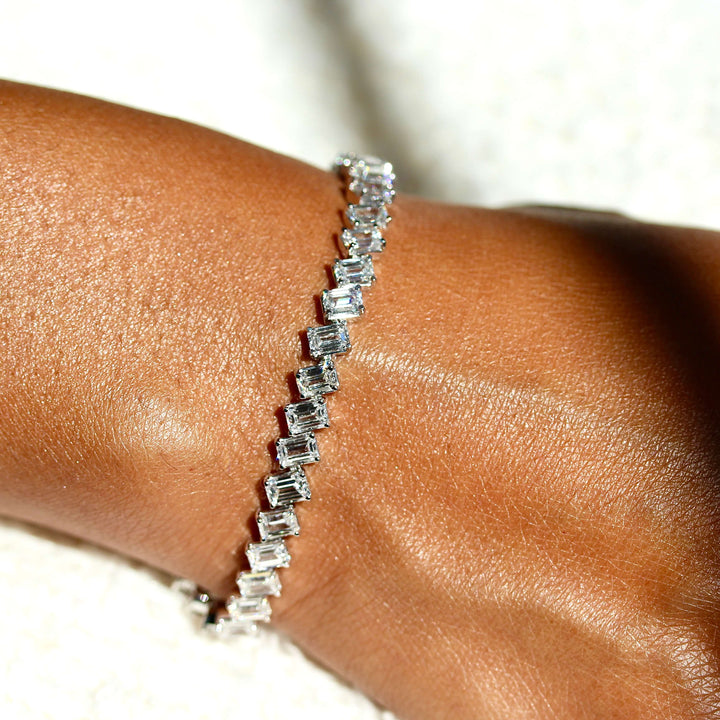 The Emerald Tennis Bracelet in white gold modeled