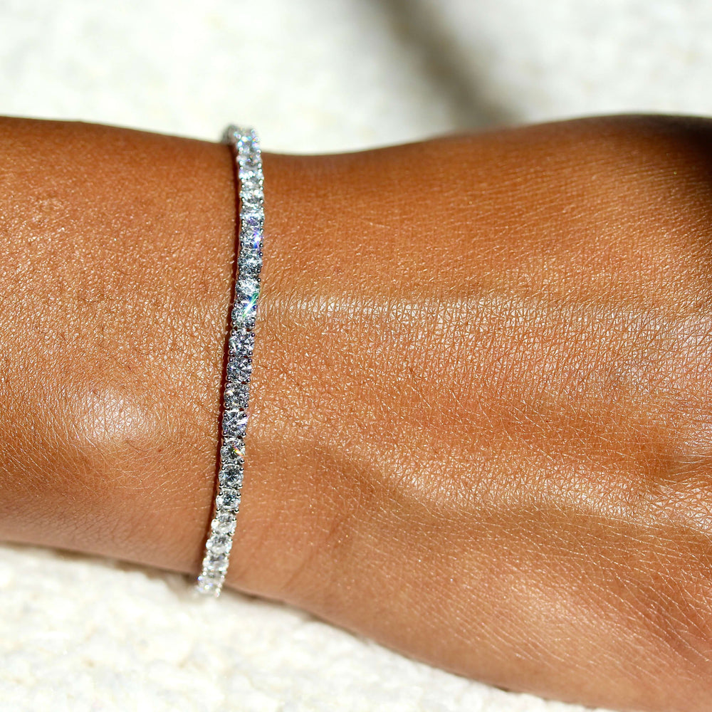 The Classic Lab Grown Diamond Tennis Bracelet in White Gold and 6.02ct modeled on a hand