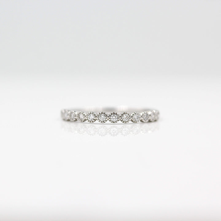 The Florence Wedding Band in white gold against a white background