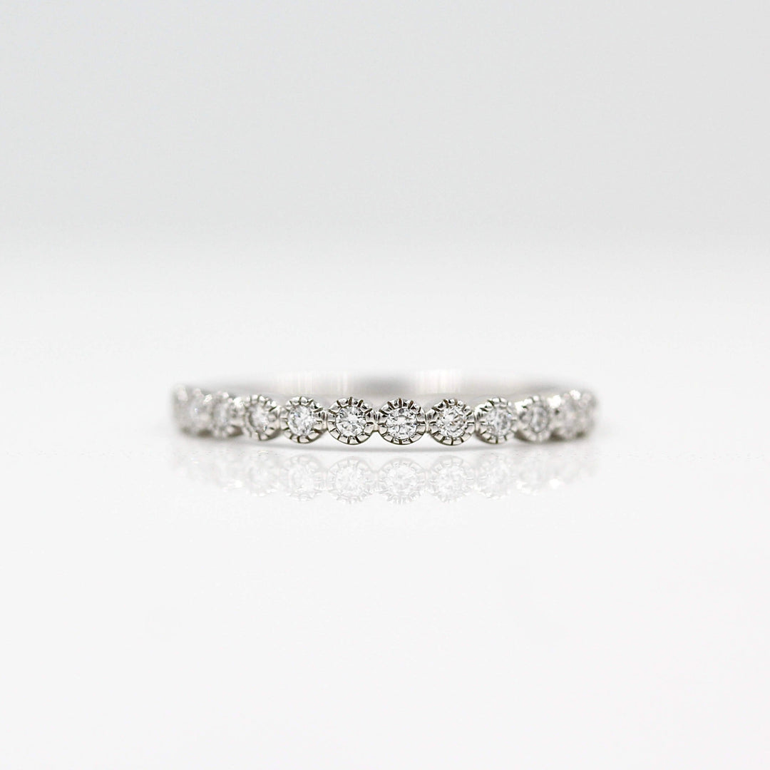 The Florence Wedding Band in white gold against a white background