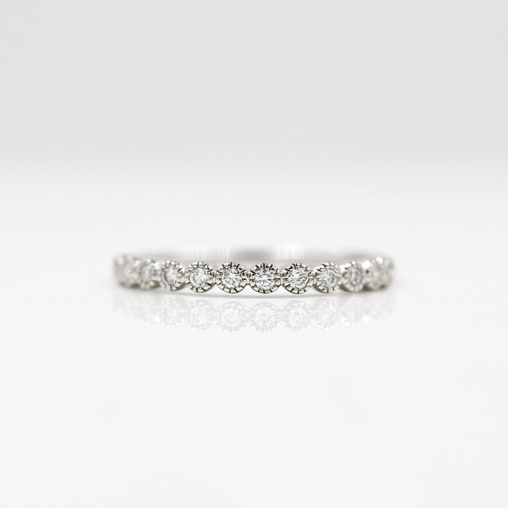 The Florence Wedding Band in white gold against a white background