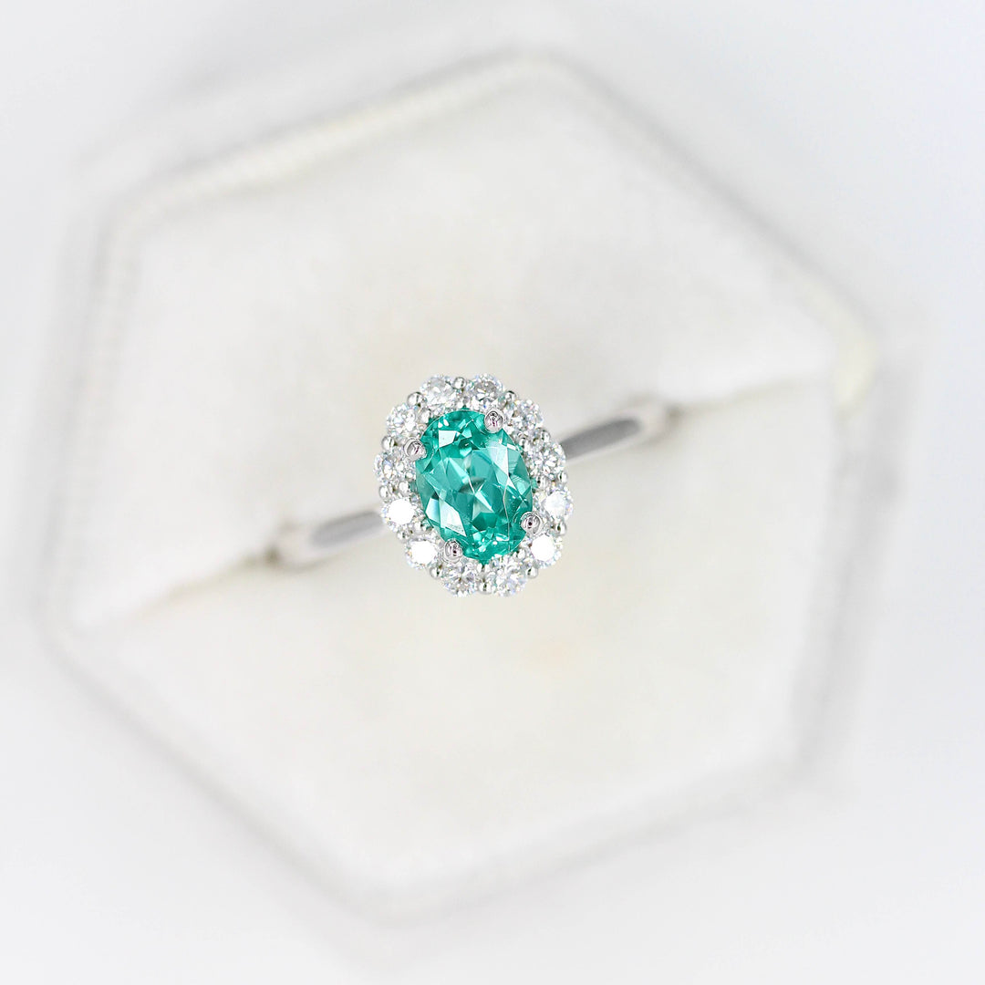 The Ava Ring with Minty Green Paraiba Color Chrysoberyl in white gold in a white velvet ring box