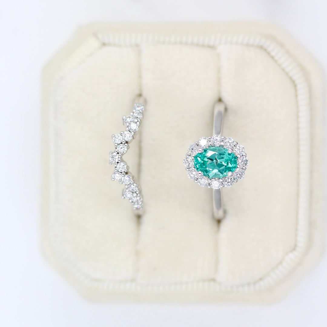 The Ava Ring with Minty Green Paraiba Color Chrysoberyl in white gold with the Nova Wedding Band in white gold in a white velvet ring box