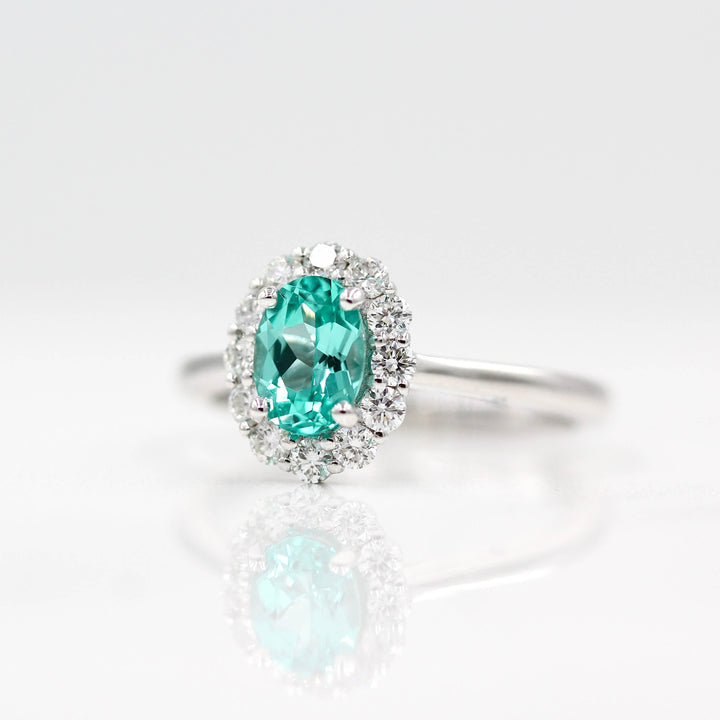 The Ava Ring with Minty Green Paraiba Color Chrysoberyl in white gold against a white background