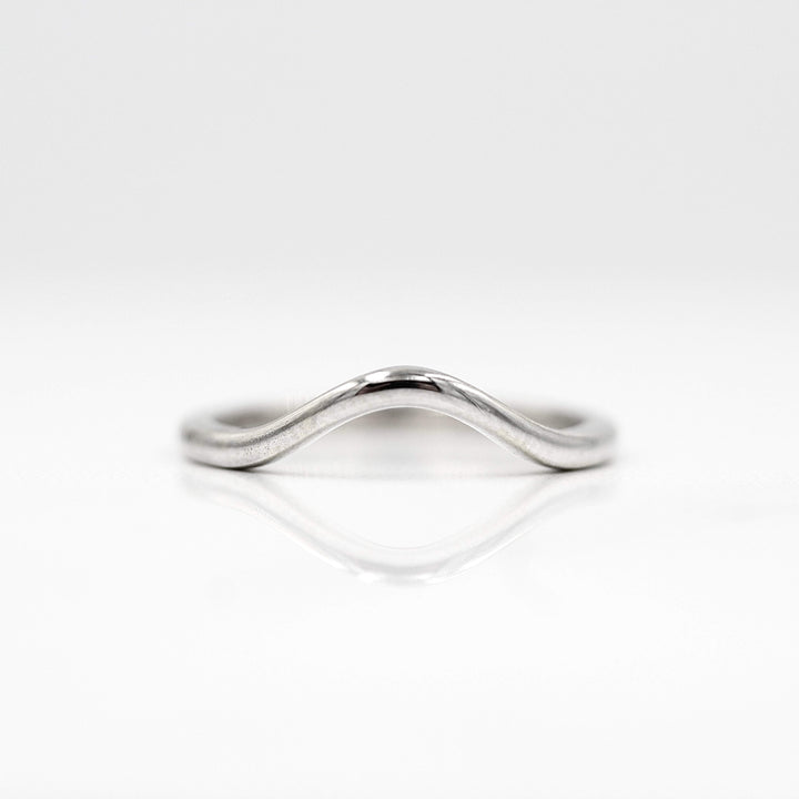 The Wave Wedding Band in White Gold against a white background