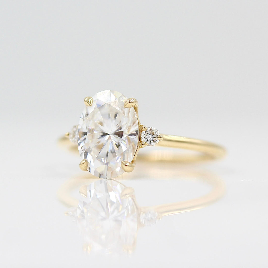 Esme oval ring in yellow gold against a white background