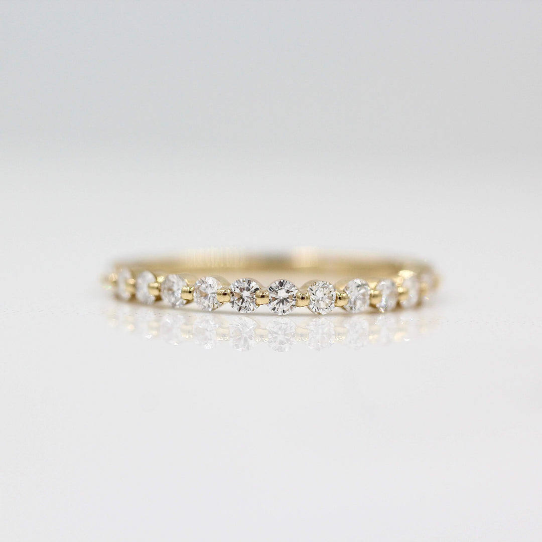 The Carly Wedding Band in Yellow Gold against a white background