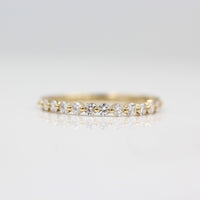 The Carly Wedding Band in Yellow Gold against a white background