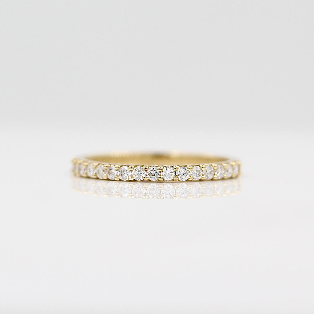 The Elizabeth Wedding Band in Yellow Gold against a white background