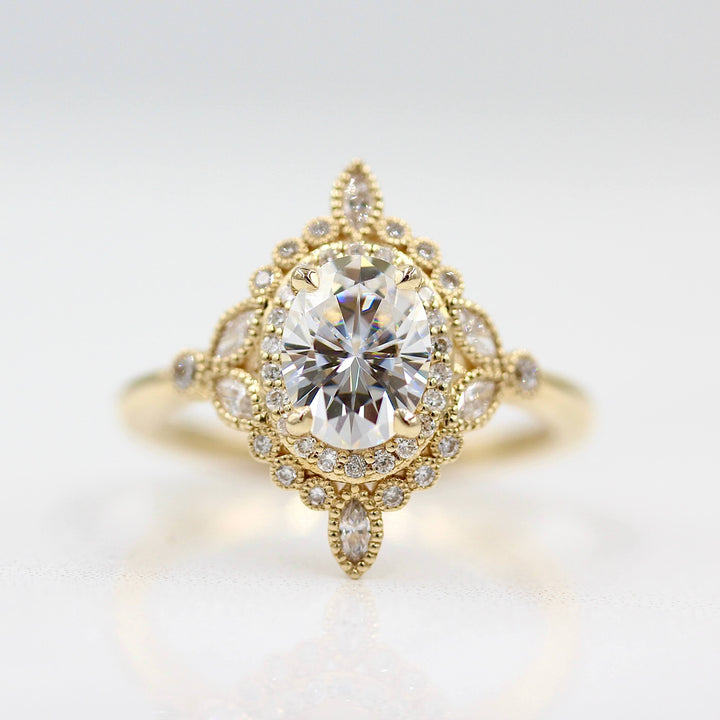 The Stella ring in Yellow Gold against a white background