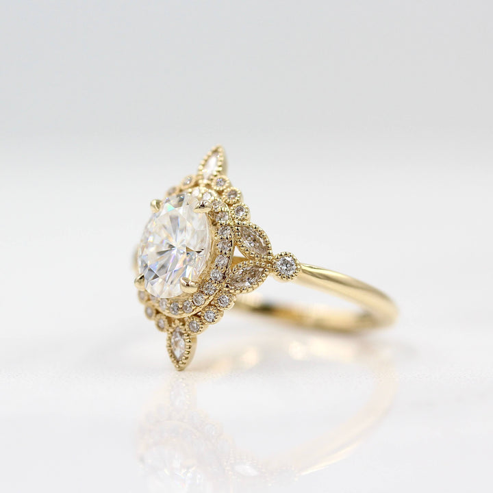 The Stella ring in Yellow Gold against a white background
