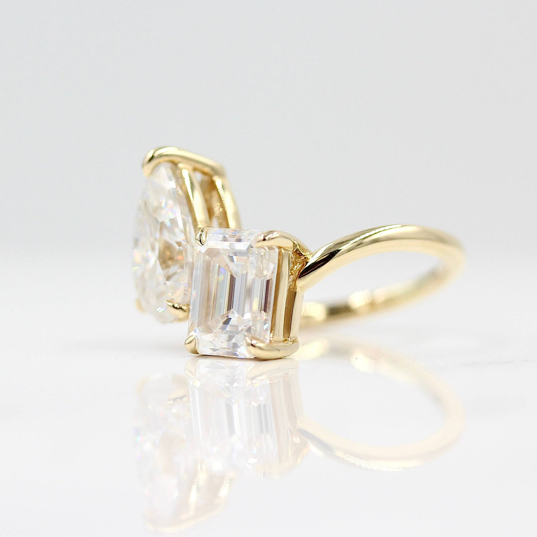 La Grande Toi Et Moi Ring in Yellow Gold and Moissanite against a white background 