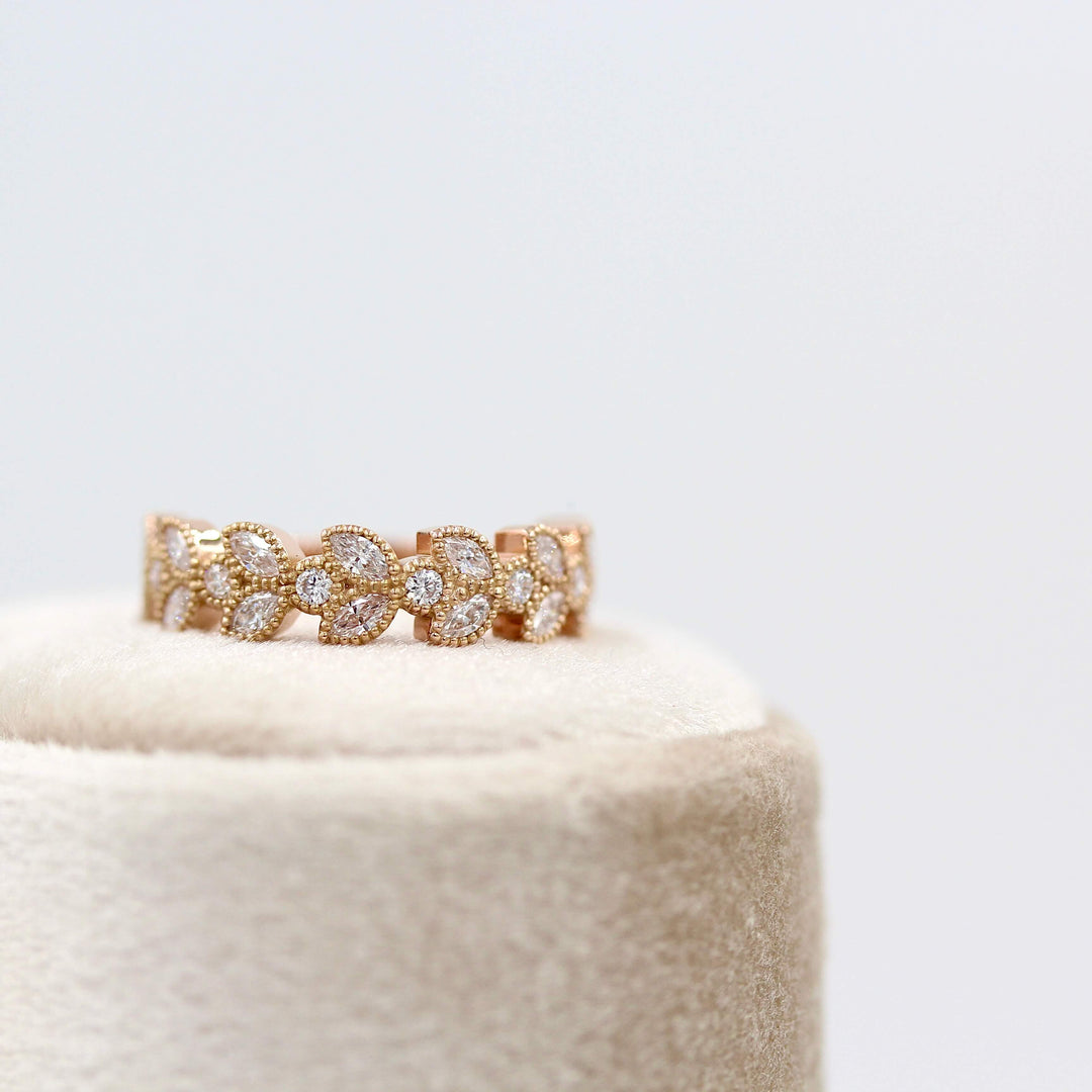 The Salimata Ring in Rose Gold on a tan velvet ring box