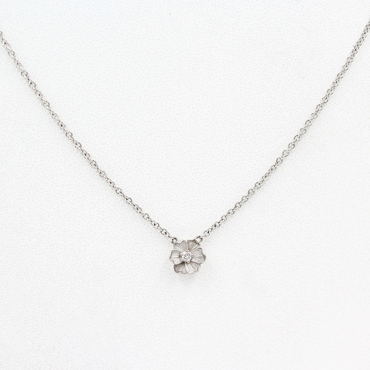 The Poppy Necklace in White Gold against a white background