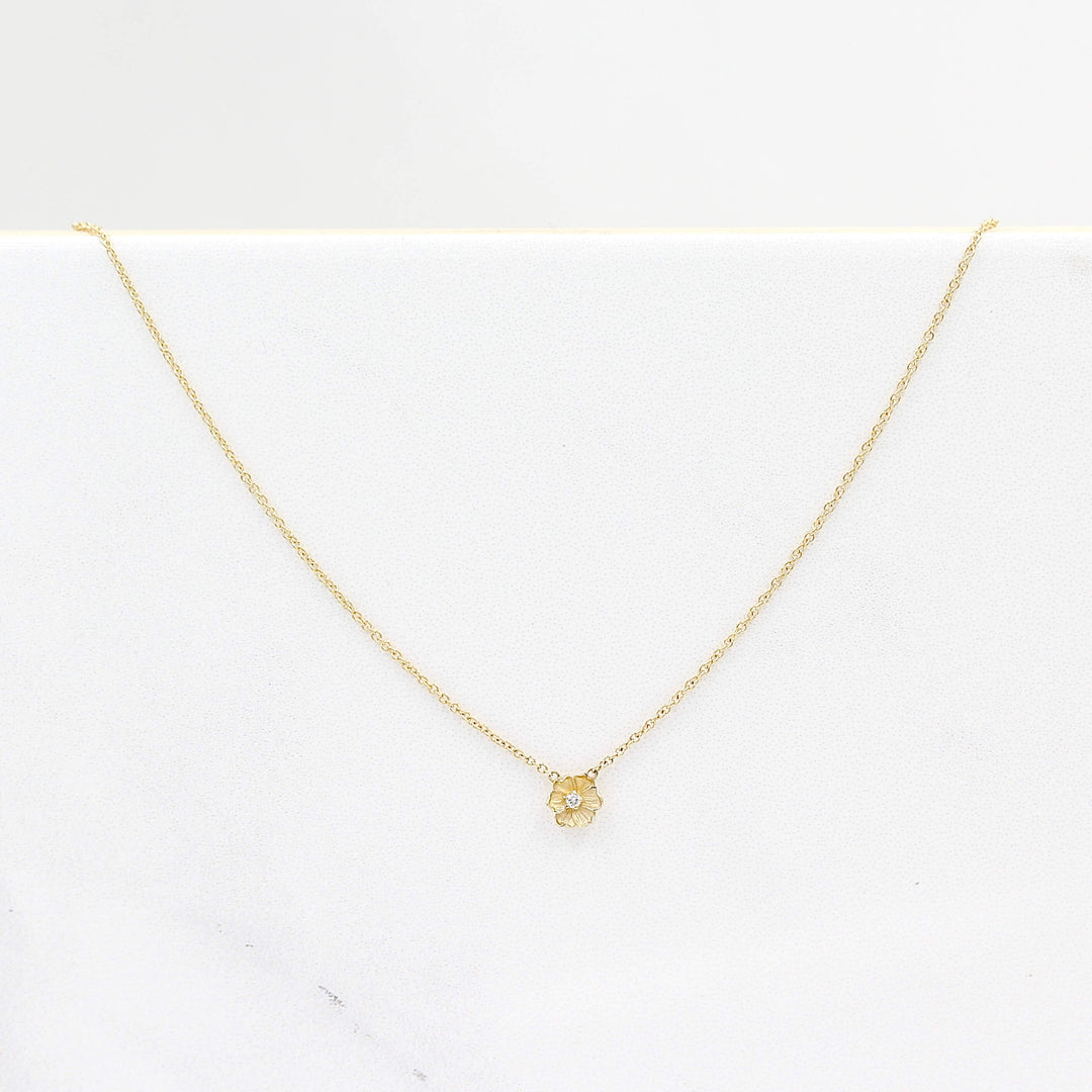 The Poppy Necklace in Yellow Gold against a white background