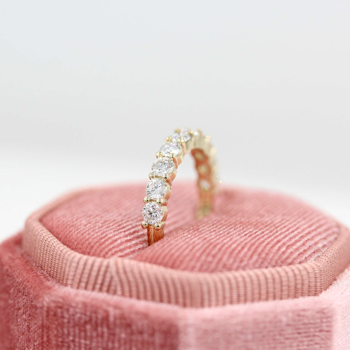 The Lexington Wedding Band in Yellow Gold in a pink velvet ring box