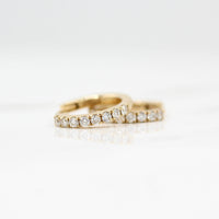 12mm Diamond Huggies in Yellow Gold against a white background