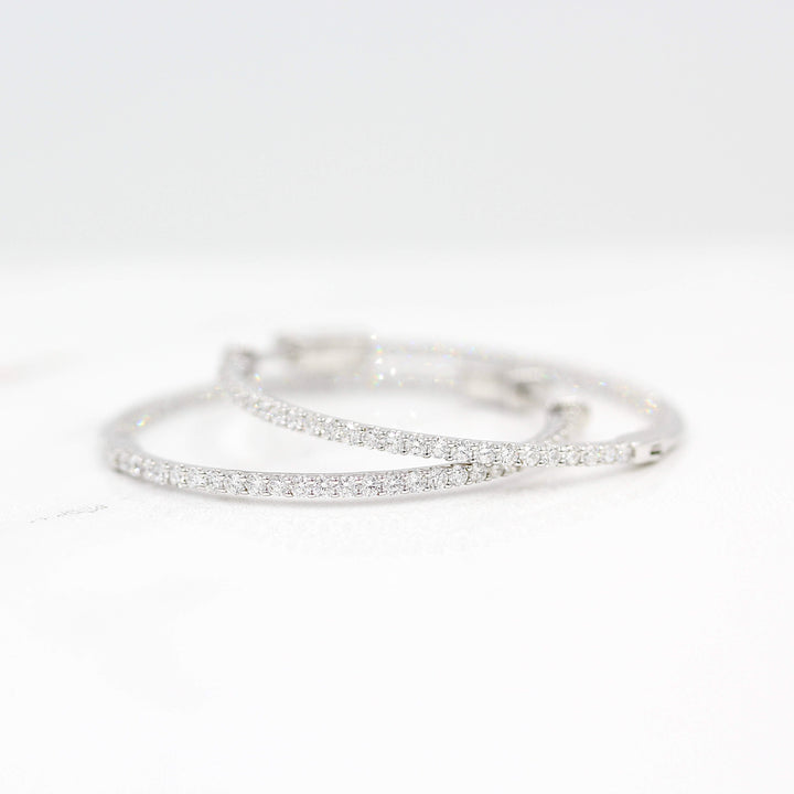 Inside and Outside Hoops in white gold against a white background