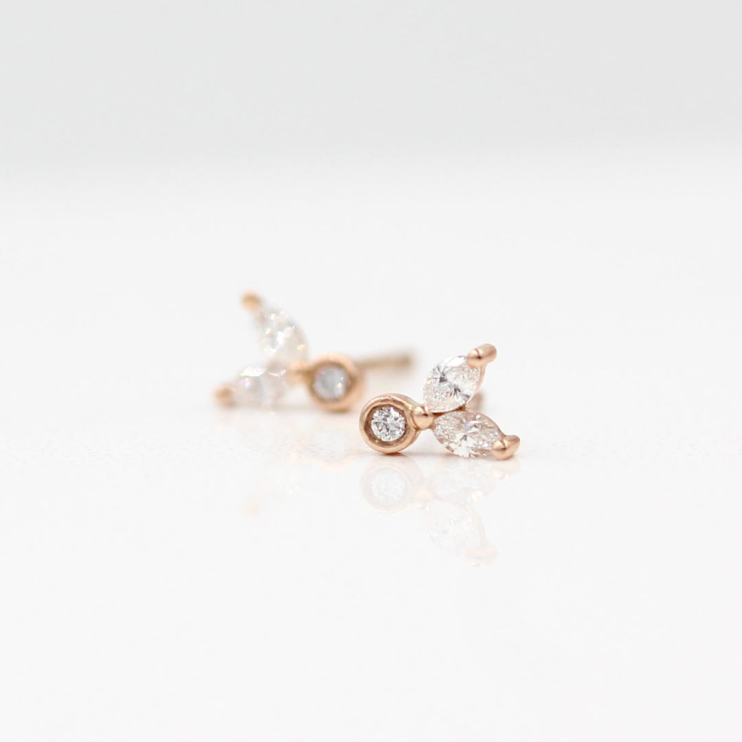 The Sophia Earrings in rose gold against a white background